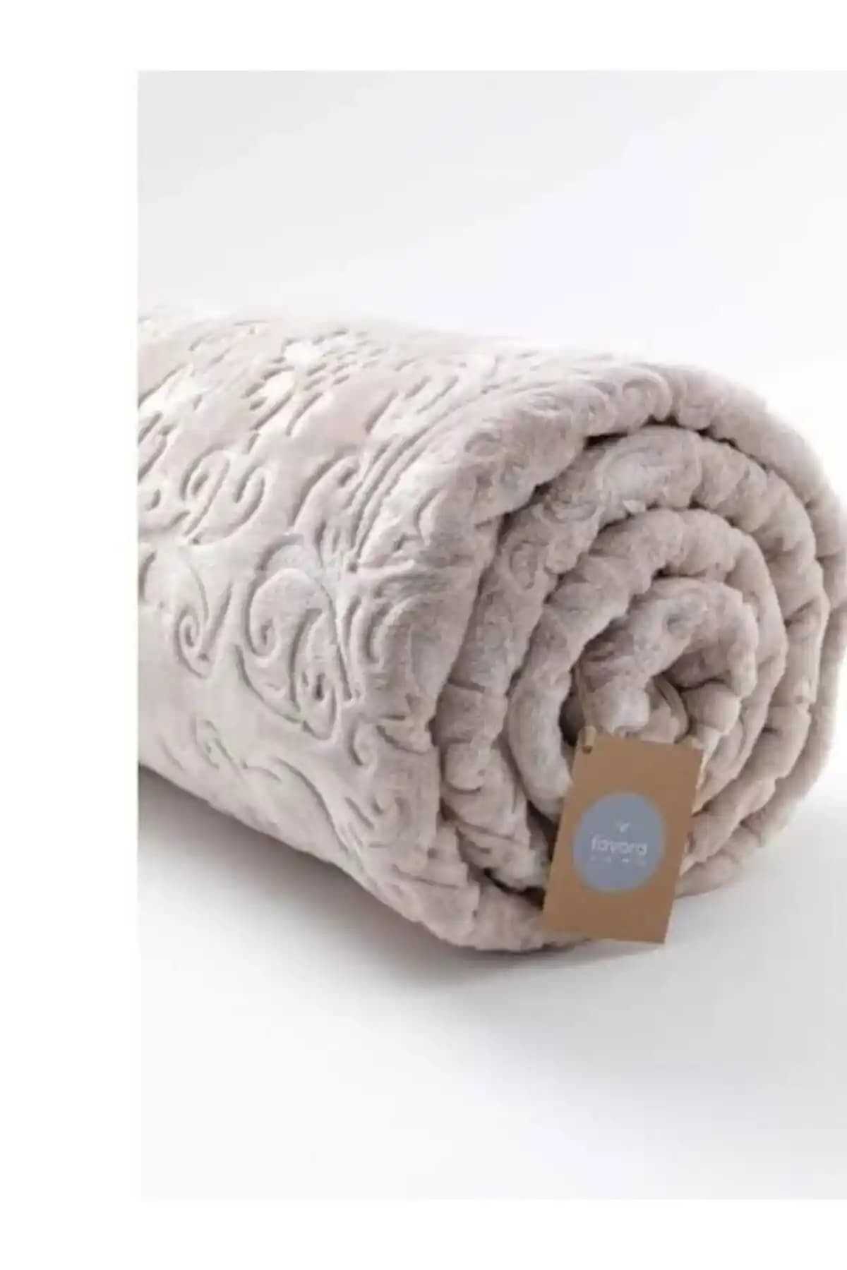 Dinarsu Battaniye: Ev Tekstili Ürünü Olarak Özellikleri ve Kullanım Alanları