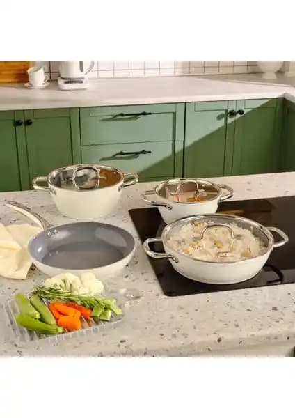 Karaca ve Refika Birgül İş Birliğiyle Tasarlanan Swiss Crystal Metal Kulplu 7 Parça Tencere Seti