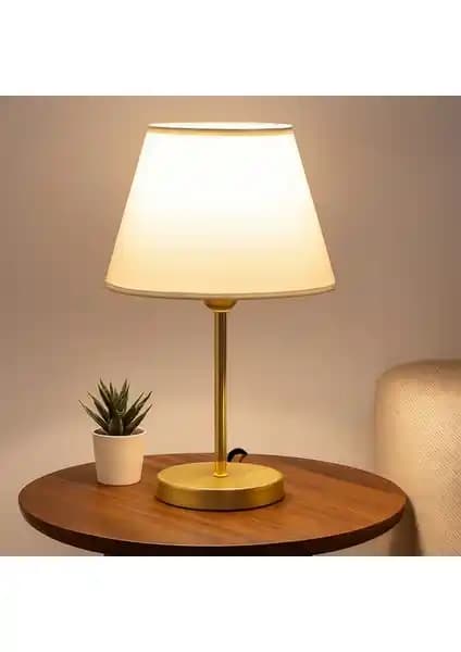 Homing Gold ve Kumaş Başlık Abajur Karşılaştırması: Tasarım, Malzeme ve Kullanım Özellikleri