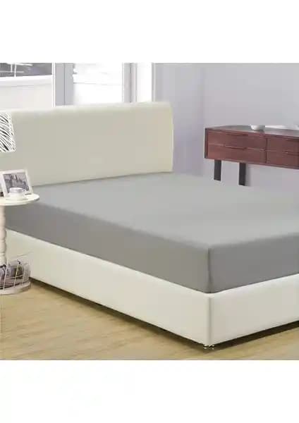 Ezgi Tek Kişilik Lastikli Kumaş Çarşaf: Yatak Konforu ve Dayanıklılık Sunan Ürün