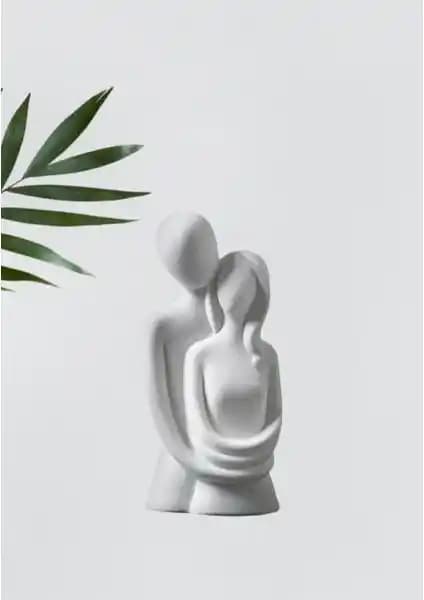 Yaka Dizayn Sarılan Sevgili Biblo: Estetik ve Anlamı Buluşturan Dekoratif Ürün