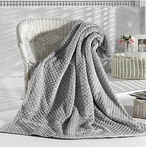 Merinos Tomurcuk Battaniye ile Dekorasyonun Şıklığı ve Konforu Sağlayan Çözüm